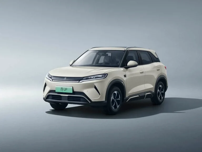 BYD Yuan Up compact electric SUV exterior front three-quarter view in beige, small EV crossover with modern LED headlights and black roof design
