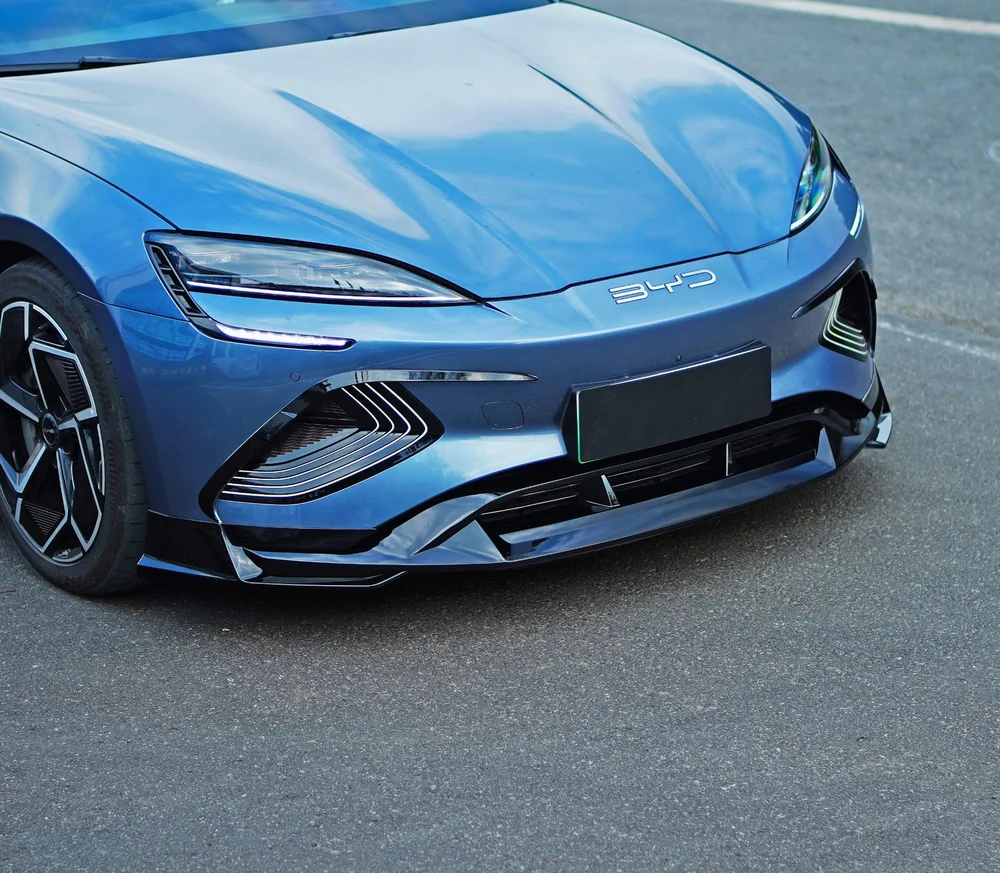Marvix front bumper lip fitted under the front bumper of a blue BYD Seal, front view