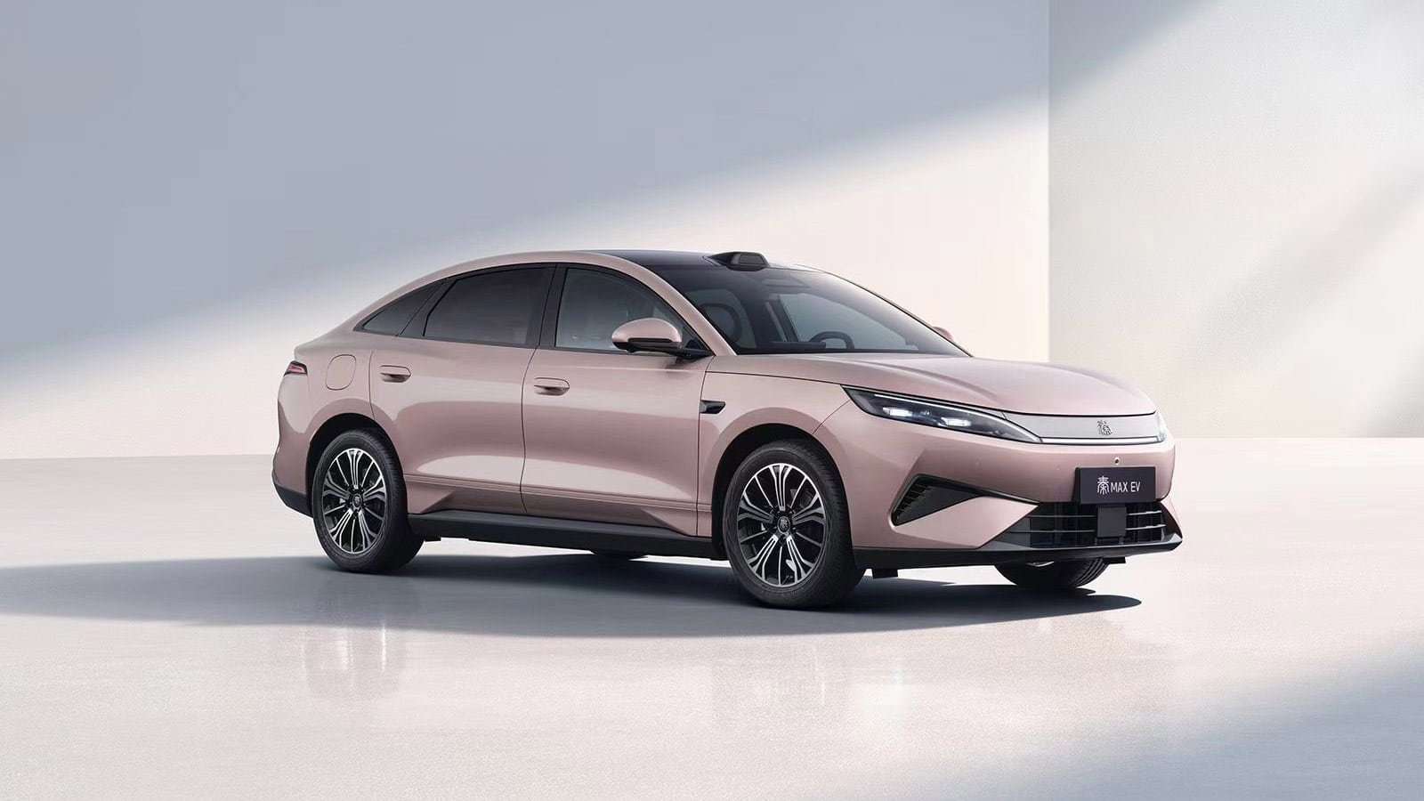 BYD Qin Max sedan shown from the front three-quarter view