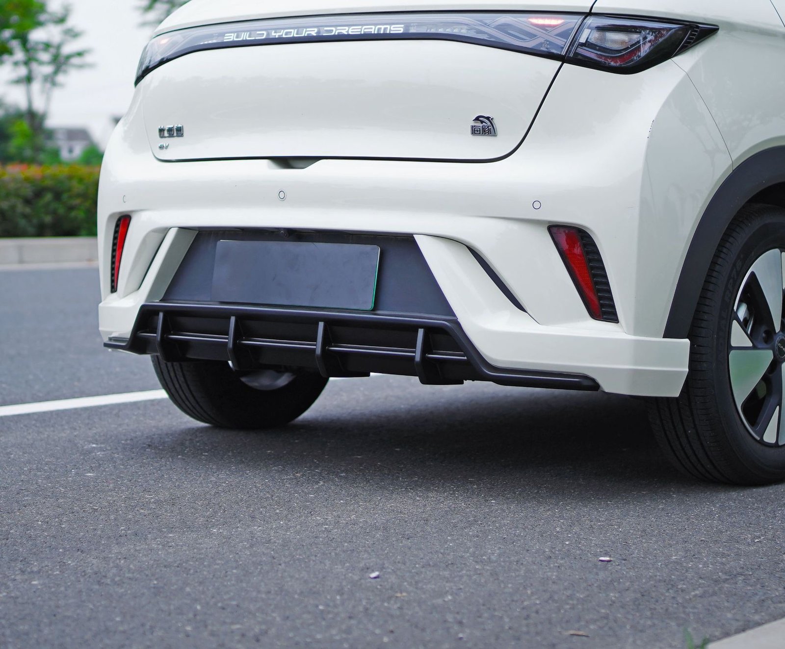 Marvix rear bumper part fitted to a white BYD Dolphin, rear view