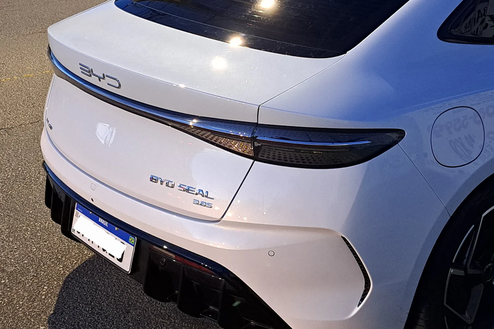 Rear detail of a BYD Seal showing bumper and light surfaces
