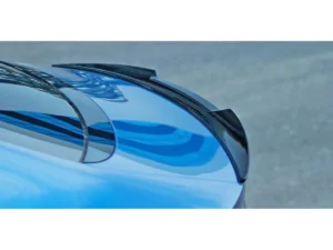 Rear spoiler wing fitted to a BYD, viewed from behind on a road