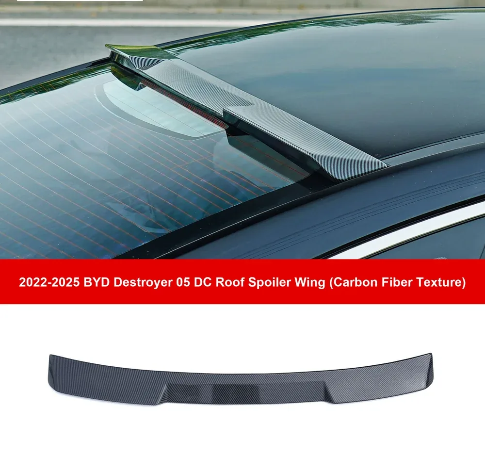 Carbon-texture roof spoiler wing for a BYD, showing the weave pattern