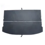 Cover plate for the BYD Dolphin rear trunk storage box on a white background