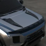Angled view of the BYD Shark 6 hood showing the black hood vent trim panels