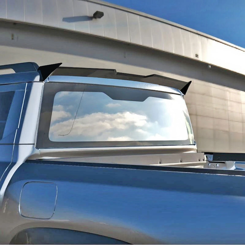 Installed BYD Shark 6 roof spoiler seen from the rear side of the pickup