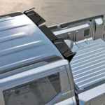 Side detail of the BYD Shark 6 roof spoiler wing tip