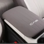 Gray silicone armrest box cover fitted on the BYD Song Plus center console