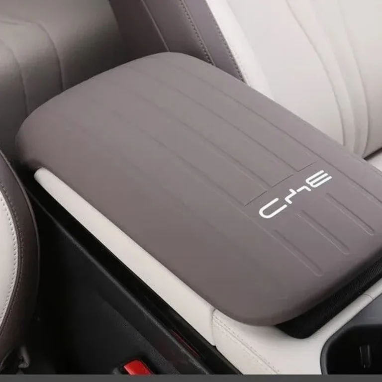 BYD Song Plus DM-i armrest box cover in gray silicone on a white background